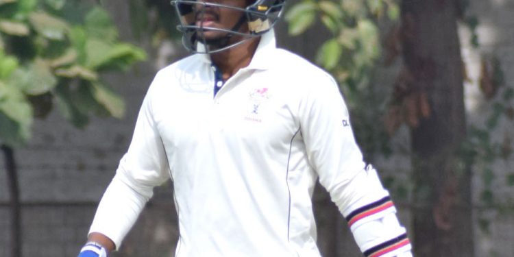 Subhranshu Senapati walks into bat against Uttar Pradesh at KIIT Stadium in Bhubaneswar, Monday