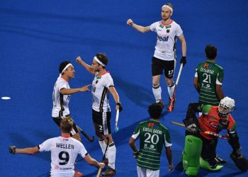 Germany players (in white) celebrate after scoring the winners against Pakistan at Kalinga Stadium, Saturday