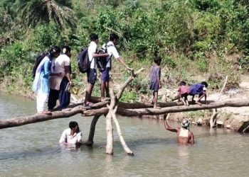 Determined for education, students cross river dangerously to reach school