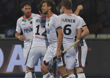 Germany players celebrate one of their goals against Malaysia at the Kalinga Stadium, Sunday