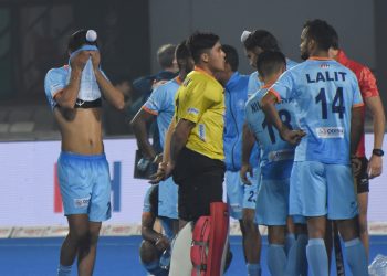 Dejected India players after their loss against Netherlands in the Men's HWC quarterfinal at the Kalinga Stadium, Thursday