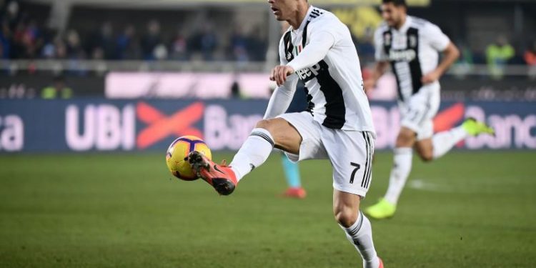 Juventus’ Portuguese forward Cristiano Ronaldo controls the ball against Atalanta in Milan, Wednesday