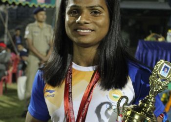 Dutee Chand poses with her medals and best women’s athlete trophy in Cuttack, Sunday   