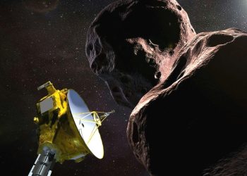 This artist's illustration obtained from NASA on December 21, 2018 shows the New Horizons spacecraft encountering 2014 MU69 – nicknamed “Ultima Thule” – a Kuiper Belt object that orbits one billion miles beyond Pluto