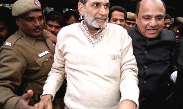 Sajjan Kumar is being taken into custody