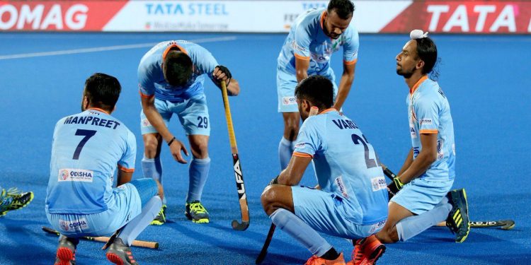 Indian players wear a dejected look after losing their quarterfinal match against the Netherlands in the Men’s Hockey World Cup in Bhubaneswar