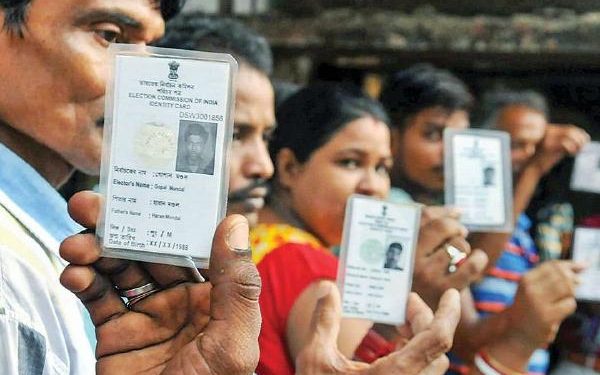 Voters queue up in front of the Polling Booth to cast their votes in the on going Telangana Panchyat Polls (PTI)