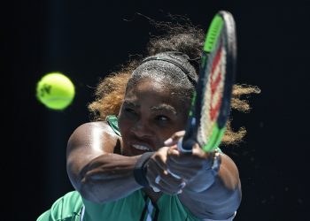 United States' Serena Williams makes a backhand return to Karolina Pliskova of the Czech Republic during their quarterfinal match at the Australian Open tennis championships in Melbourne, Australia, Wednesday, Jan. 23, 2019. (AP)