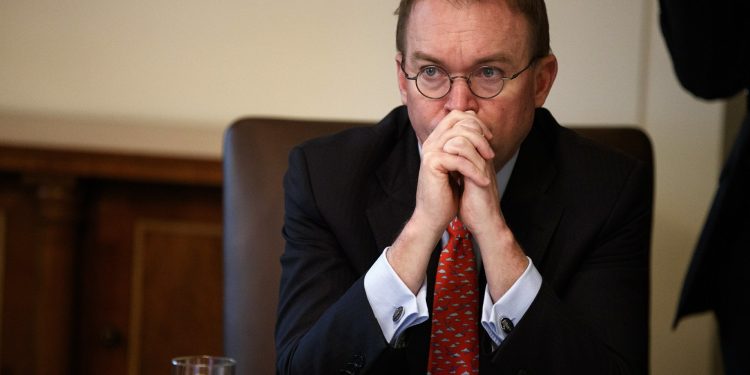 In this Jan. 2, 2019, file photo White House chief of staff Mick Mulvaney listens as President Donald Trump speaks during a cabinet meeting at the White House in Washington. Mulvaney says Trump is prepared for another government shutdown if Congress won't work with him to secure the southern border. Mulvaney spoke Sunday, Jan. 27, on CBS' "Face the Nation" and "Fox News Sunday." (AP)