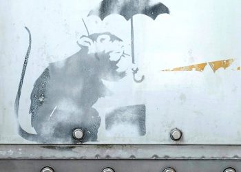 The Tokyo government is trying to verify if the drawing of a rat on one of the city's monorail stations was created by Banksy (AFP)
