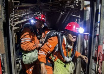 Rescue workers at the site of the mining accident, Saturday at Shaanxi province in China