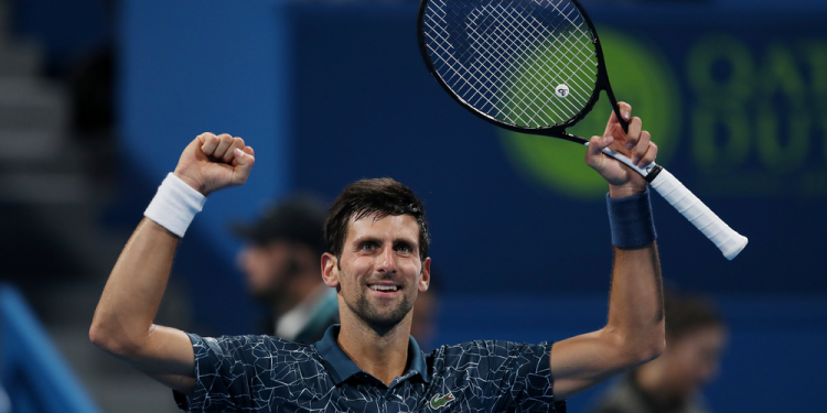 Novak Djokovic celebrates after beating Marton Fucsovics in Doha, Wednesday