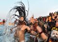 File pic. Naga Sadhus take dip at the Maha Kumbh (AP)