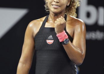 Naomi Osaka reacts after winning against Destanee Aiava in Brisbane, Thursday    