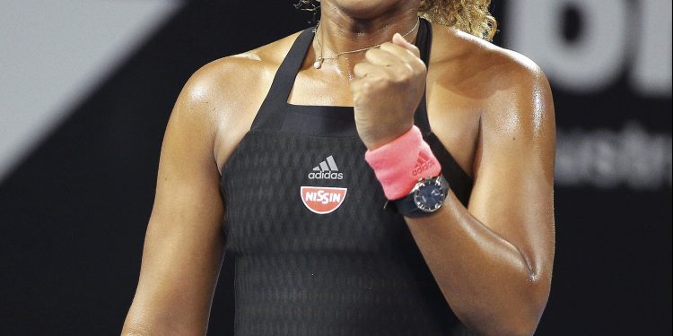 Naomi Osaka reacts after winning against Destanee Aiava in Brisbane, Thursday    