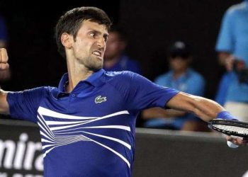 Serbia's Novak Djokovic celebrates after winning a point against Mitchell Krueger. (AP)