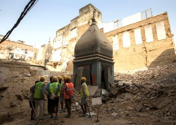 India's ancient city of Varanasi is clearing the way for a grand temple corridor by razing hundreds of houses, wiping away its oldest neighbourhood and upsetting locals (AFP)