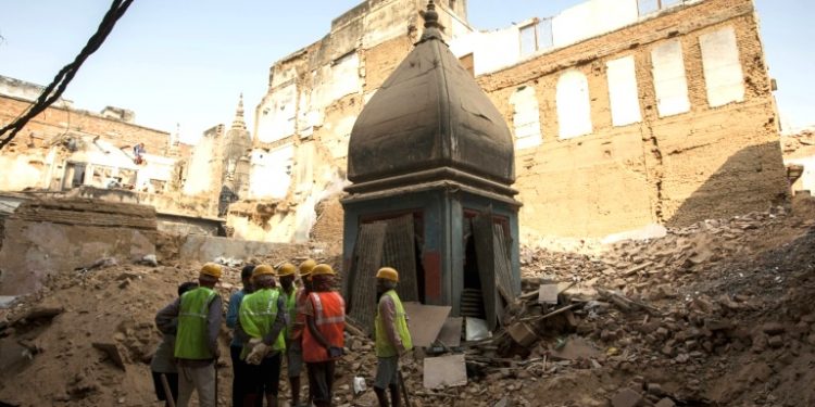 India's ancient city of Varanasi is clearing the way for a grand temple corridor by razing hundreds of houses, wiping away its oldest neighbourhood and upsetting locals (AFP)