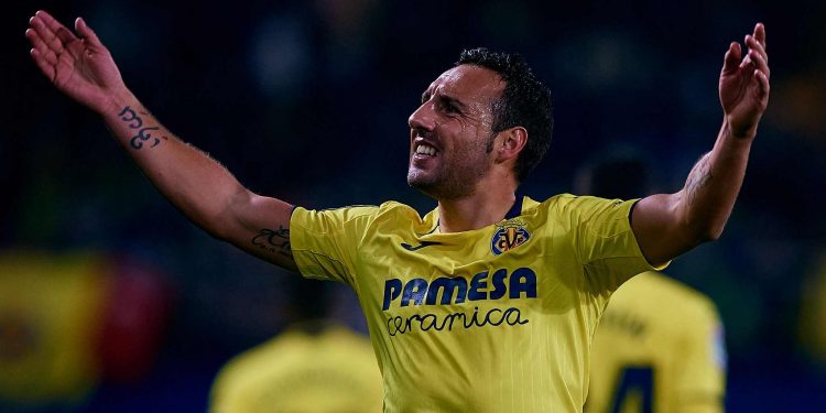 Santi Cazorla gestures towards the gallery after scoring one of his two goals against Real Madrid Thursday