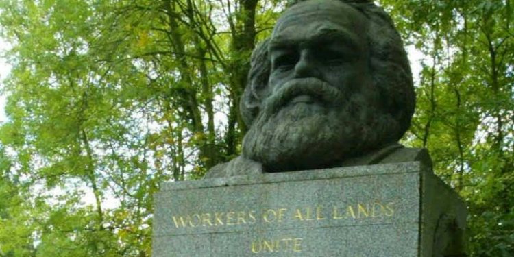 The granite slab monument in Highgate Cemetery, north London, (pictured in 2004) was funded in 1956 by the Communist Party of Great Britain (AFP)