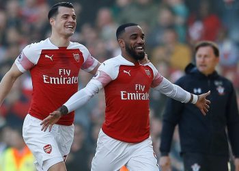 Arsenal’s Alexandre Lacazette (R) and Granit Xhaka races away in delight after scoring against Southampton, Sunday