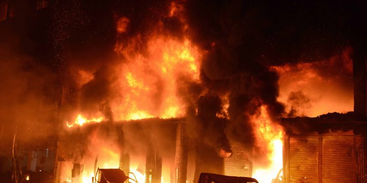 Massive flames engulf the warehouse buildings in Dhaka, Wednesday night