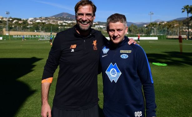 Jurgen Klopp (L) and Ole Gunnar Solskjaer