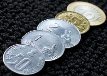 Rupee gains 12 paise against dollar in early trade