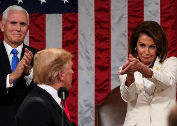 President Donald Trump turns to House speaker Nancy Pelosi of Calif., as he delivers his State of the Union address to a joint session of Congress on Capitol Hill in Washington, as Vice President Mike Pence watches, Tuesday, Feb. 5, 2019. (AP)