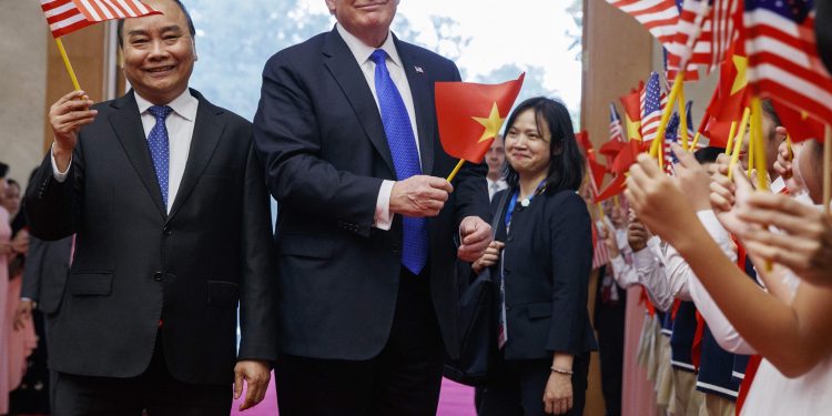 US President Donald Trump with Vietnam Prime Minister Nguyen Xuan Phuc at Hanoi after his arrival Wednesday