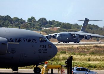 A second US Air Force plane carrying humanitarian aid for Venezuela taxis after landing at Camilo (AP)