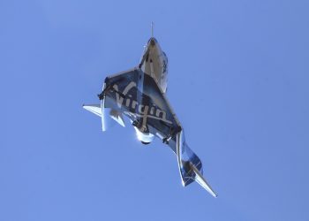 Virgin Galactic's VSS Unity returns to Mojave Air and Space Port after reaching space Friday, Feb. 22, 2019, in Mojave, Calif. Virgin The company says the winged spaceship reached an altitude of 55.8 miles (89.8 kilometers). In addition to two pilots, the spacecraft carried a third crewmember to evaluate the cabin from a passenger perspective. (AP)