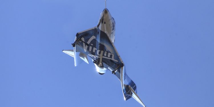 Virgin Galactic's VSS Unity returns to Mojave Air and Space Port after reaching space Friday, Feb. 22, 2019, in Mojave, Calif. Virgin The company says the winged spaceship reached an altitude of 55.8 miles (89.8 kilometers). In addition to two pilots, the spacecraft carried a third crewmember to evaluate the cabin from a passenger perspective. (AP)