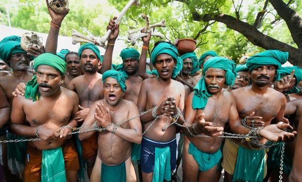 Tamil farmers during their protest with skulls and bones for loan waiver and drought-relief package at jantar Mantar Delhi (PTI) *representational Image*