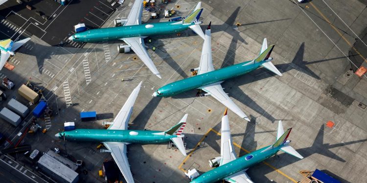 An aerial photo shows Boeing 737 MAX airplanes parked on the tarmac at the Boeing Factory in Renton, Washington, U.S. March 21, 2019. (REUTERS/Lindsey Wasson/File Photo)