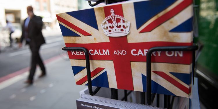 Postcards featuring the World War II British slogan "Keep Calm and Carry On" are seen outside a newsagents in London, on 24 June, 2016. 
Three years after a referendum in which Britain voted to leave the European Union, the country is gripped by painful uncertainty over how -- or even whether -- it should put an end to its 46-year membership (AFP)