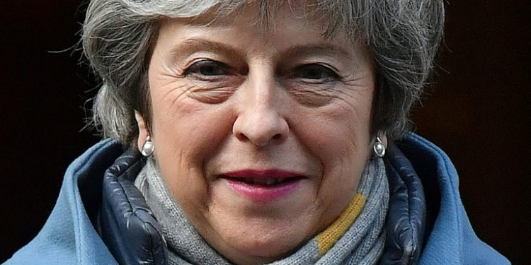 With Britain scheduled to leave the EU in just nine days, British Prime Minister Theresa May will ask Brussels for only a short delay, according to the BBC (AFP)