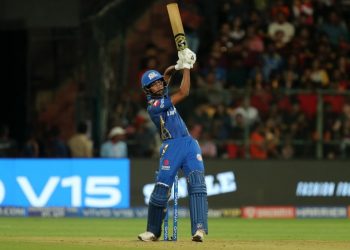 Hardik Pandya hits a six against Royal Challengers Bangalore at M Chinnaswamy Stadium in Bangalore