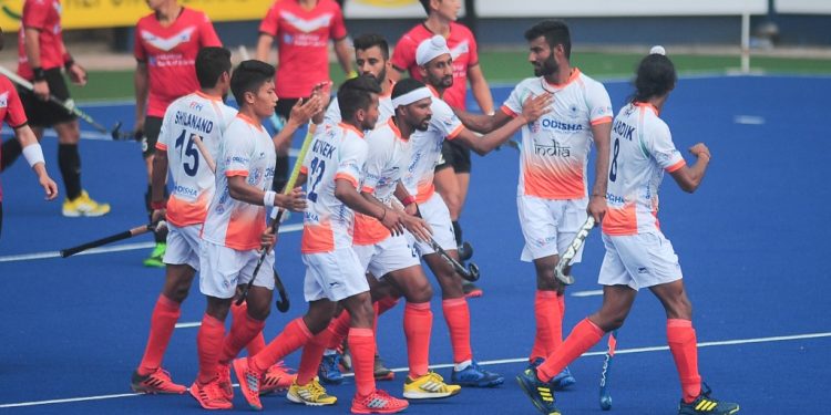 Indian players celebrate after scoring a goal against Korea in Ipoh, Sunday  