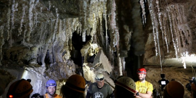 Israeli cave explorers show the Malham cave inside Mount Sodom, located at the southern part of the Dead Sea in Israel (AFP)