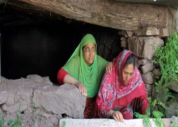 women come out as they clean an underground bunker in balkote URI  near the Line of control. The people living along the LOC are living in constant fear due to the hostilities between india pakistan. Express Photo by Shuaib Masoodi. 04.06.2017. *** Local Caption *** women come out as they clean an underground bunker in balkote URI  near the Line of control. The people living along the LOC are living in constant fear due to the hostilities between india pakistan. Express Photo by Shuaib Masoodi. 04.06.2017.