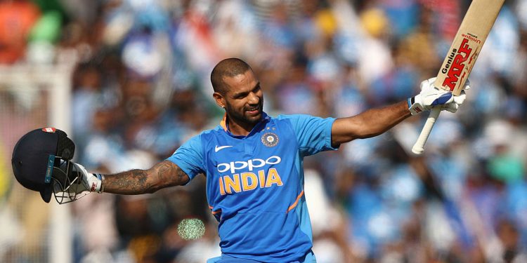 Shikhar Dhawan acknowledges the applause of the crowd after scoring his century against Australia in Mohali, Sunday