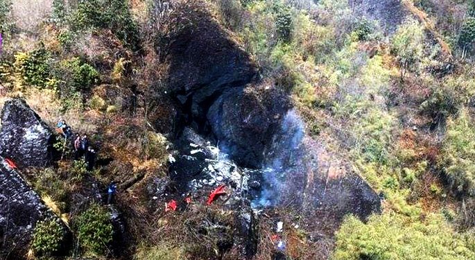 Photo taken on Feb. 27, 2019 shows the crash site of the aircraft in Taplejung, Nepal. All seven people onboard were confirmed dead, including Nepal's Tourism Minister Rabindra Adhikari, in a helicopter crash in Taplejung district of eastern Nepal Wednesday afternoon, Spokesperson of Nepal Police Uttam Raj Subedi confirmed. (AFP)