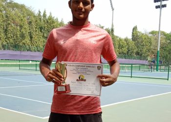 Pratyush Mohanty poses with the winner’s trophy and certificate in Bhubaneswar, Friday  