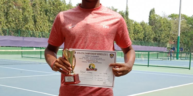 Pratyush Mohanty poses with the winner’s trophy and certificate in Bhubaneswar, Friday  