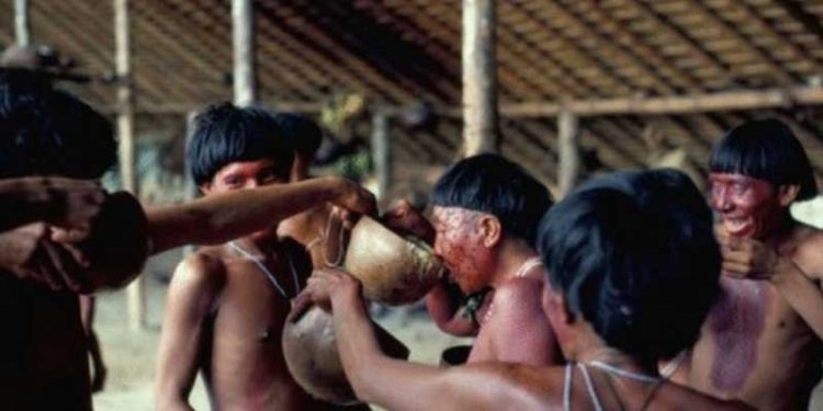 In an astoundingly grim funeral practice, the Yanomami tribe (pictured) burn the bodies of their dead and then proceed to eat them.