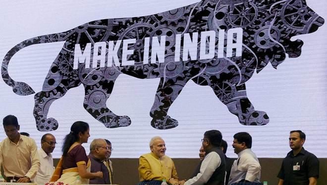 A make in India logo is displayed in the backdrop at a conclave in August 2017. (PTI)