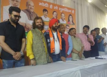 Former Indian cricket superstar Gautam Gambhir and Delhi BJP chief Manoj Tiwari were also present at the event when the Punjabi singing sensation joined the party. (Image: ANI/Twitter)