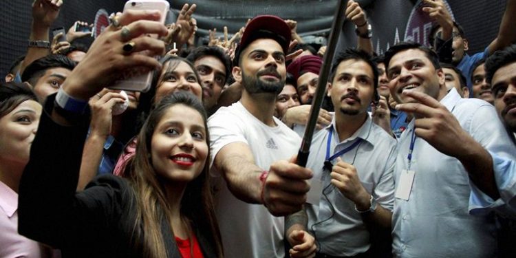 Virat Kohli posing for a selfie with fans. (Image: Representational)