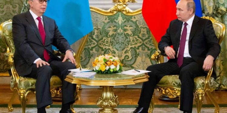 Russian President Vladimir Putin (right) speaks with Kazakhstan's new president, Kassym-Jomart Tokayev, during a meeting at the Kremlin in Moscow Wednesday. (AFP)